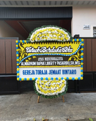 Papan Bunga Duka di Tatanga